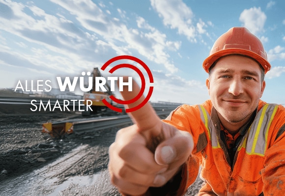 Mann auf Baustelle zeigt auf Würth Mann auf Baustelle zeigt auf Würth